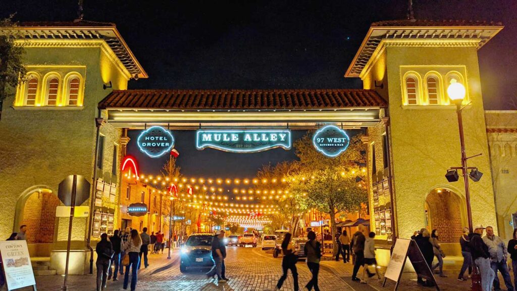 Mule Alley entrance lit up at night